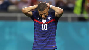 French National Football Team Frustrated Kylian Mbappe Wallpaper