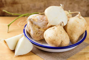 Fresh And Crisp Jicama Ready To Be Served Wallpaper