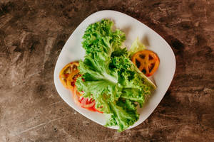 Fresh And Healthy Lettuce And Tomatoes Wallpaper