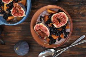 Fresh Figs Amidst A Colorful Array Of Fruits Wallpaper