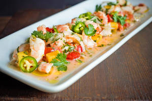 Freshly Prepared Chili Fish Ceviche On A Long Platter Wallpaper