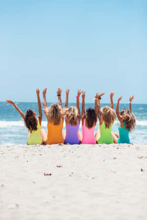 Friends Having Fun At The Beach In Summer Wallpaper