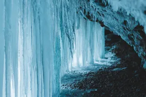 Frozen Water On Rocks Wallpaper