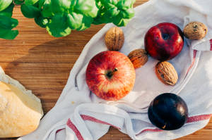 Fruits And Nuts On Table Wallpaper