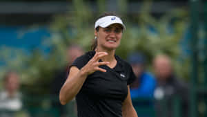 Frustrated Monica Niculescu Wearing Black Wallpaper