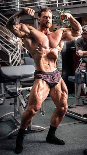 Chris Bumstead Flaunts Small Waist In Vacuum Pose Days From 2023 Mr.  Olympia – Fitness Volt