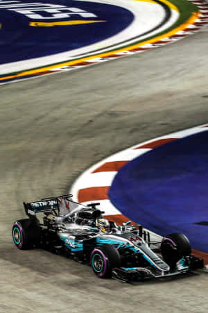 Fun And Fast - Get The Formula 1 Experience On Your Iphone Wallpaper