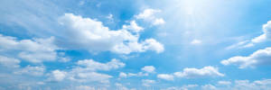 Funeral Clouds With Light Blue Skies Wallpaper