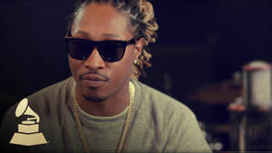 Future Rapper With Grammy Logo Wallpaper