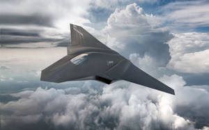 Futuristic Fighter Jet Soaring The Skies Wallpaper