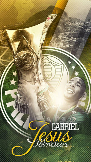 Gabriel Jesus Holds A Golden Trophy Wallpaper