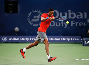 Gael Monfils In Red Shirt Wallpaper