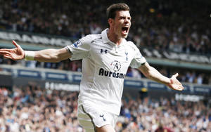 Gareth Bale Goal Celebration In Field Wallpaper