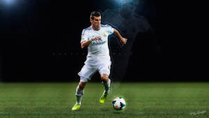 Gareth Bale With Ball In Field Wallpaper