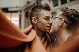 Gay Couple Kissing Photography Wallpaper