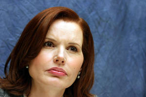 Geena Davis With A Curious Expression Wallpaper