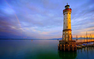 Gentle Sunset Lighthouse Wallpaper