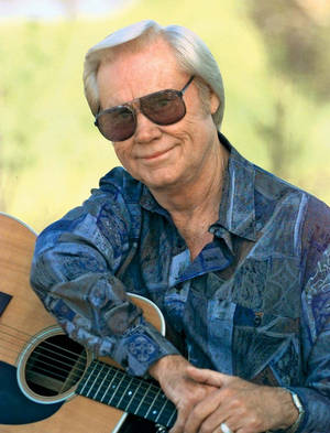 George Jones Holding Guitar Photography Wallpaper