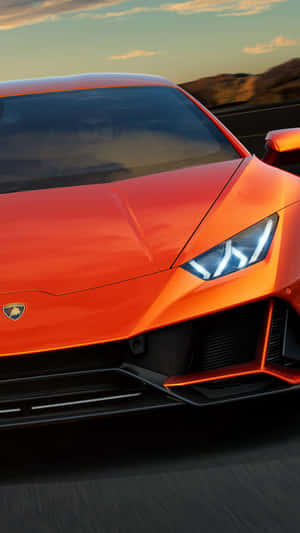 Get Behind The Wheel Of A Luxurious Lamborghini Phone. Wallpaper