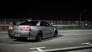 Get Behind The Wheel Of This Sleek And Stylish Cool Gtr Car. Wallpaper