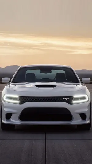 Get Charged Up For An Awesome Experience With The Dodge Charger Iphone. Wallpaper