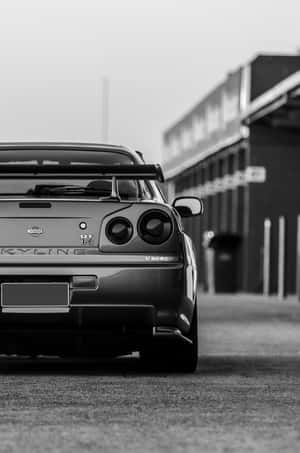 Get Ready For A Thrill Ride With The Gtr Iphone Wallpaper