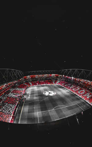 Get Ready For The Big Match In A Packed Soccer Stadium Wallpaper