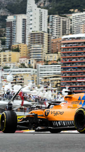 Get Ready To Experience High Speed Racing With The Formula 1 Iphone Wallpaper