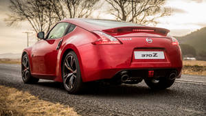 Get Ready To Hit The Road With The Nissan 370z Wallpaper