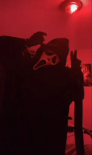 Ghostface Pfp Inside Dark Room Wallpaper