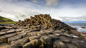 Giant's Causeway Elevated Basalt Rocks In Northern Ireland Wallpaper