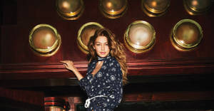 Gigi Hadid On Bar Top Wallpaper