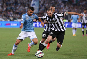 Giorgio Chiellini Vs. Felipe Anderson Tim Cup Final Wallpaper