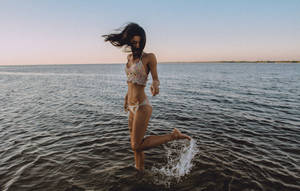 Girl In Bikini On Water Wallpaper