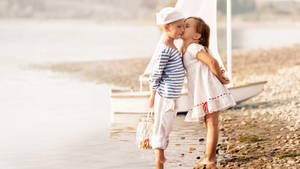 Girl Kissing Cute Boy Sailor Wallpaper