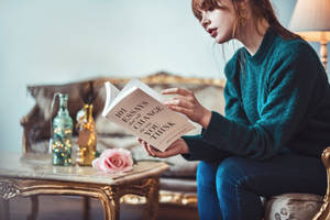 Girl Reading Book About Thinking Wallpaper