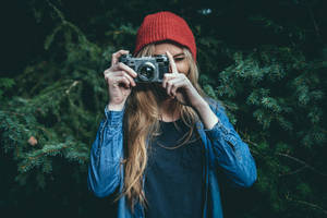 Girl Taking Photography With Camera Wallpaper