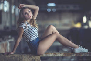 Girl With Beautiful Legs On Steel Railing Wallpaper