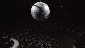 Glimmering Disco Ball Nightlife Wallpaper