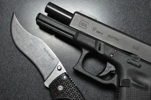 Glock 17 With Voyager Knife Wallpaper