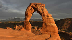 Gloomy Skies On Delicate Arch Wallpaper