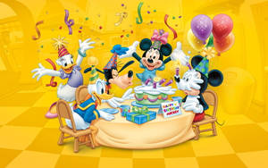 Glorious Mickey Mouse Birthday Celebration In A Vibrant Yellow Room. Wallpaper