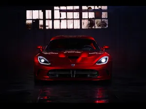 Glossy Red Dodge Viper Warehouse Wallpaper