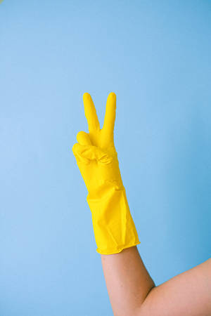 Gloved Hand Doing Peace Symbol Wallpaper