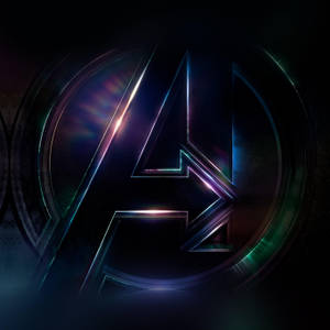 Glowing Avengers Logo Illuminating The Night Sky Wallpaper