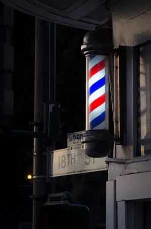 3D wallpaper showing a set of barber tools for barbershops Stock Photo -  Alamy