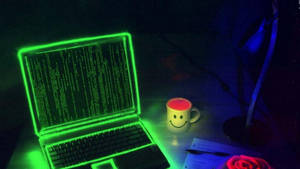 Glowing Laptop Hacker 4k Wallpaper