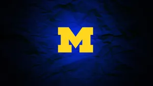 Glowing Michigan Football Team Logo Wallpaper