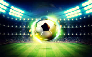 Glowing Soccer Ball At Football Field Stadium Wallpaper