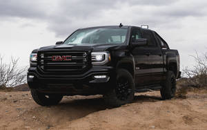 Gmc Sierra In All Black Color Wallpaper